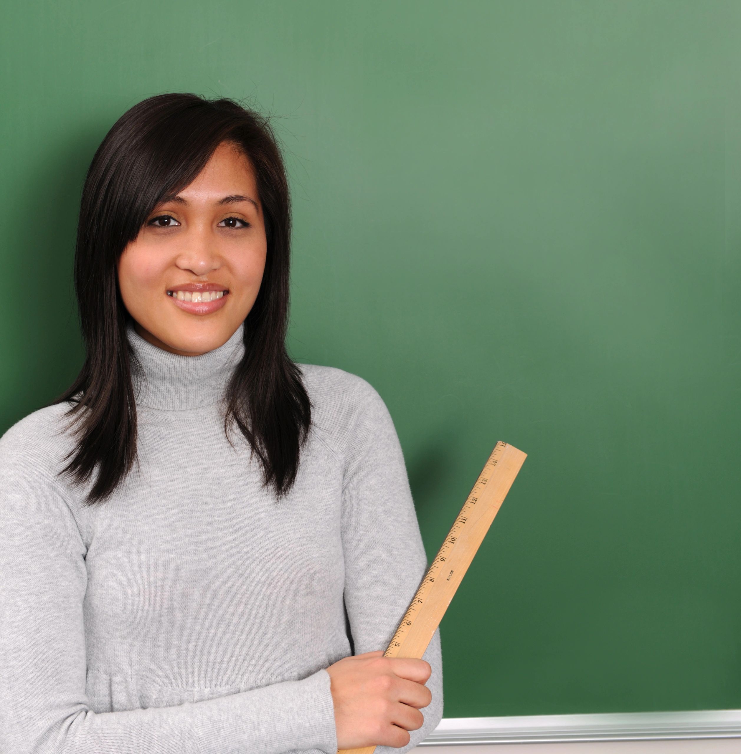 Asian professional portrait with a blackboard background